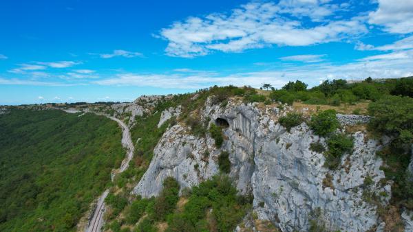 Image of little mountains / hills and a railroad track snailing along them. This time the image points in another direction.
