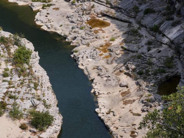 Image of a river in france in a rocky terrain.