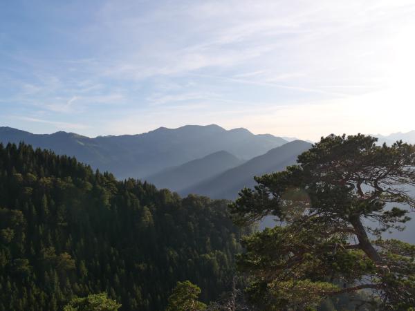 A image ouf mountains and light which shines beautiful between them.