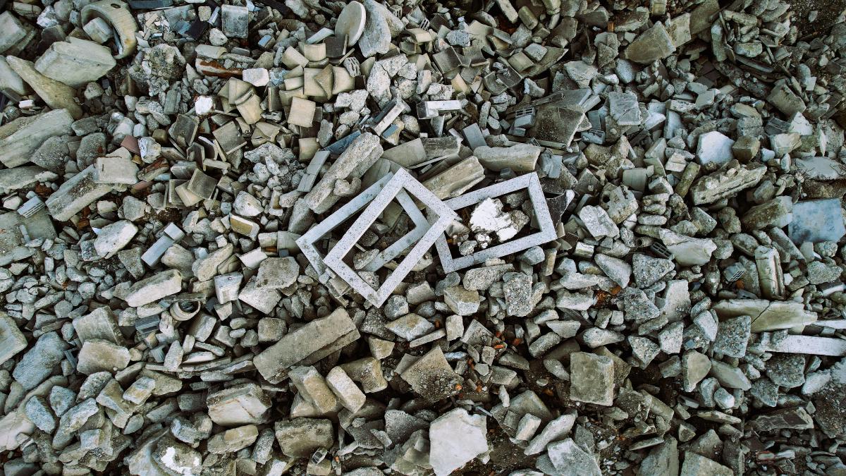 Drone photo of some stone frames lying on more stone.